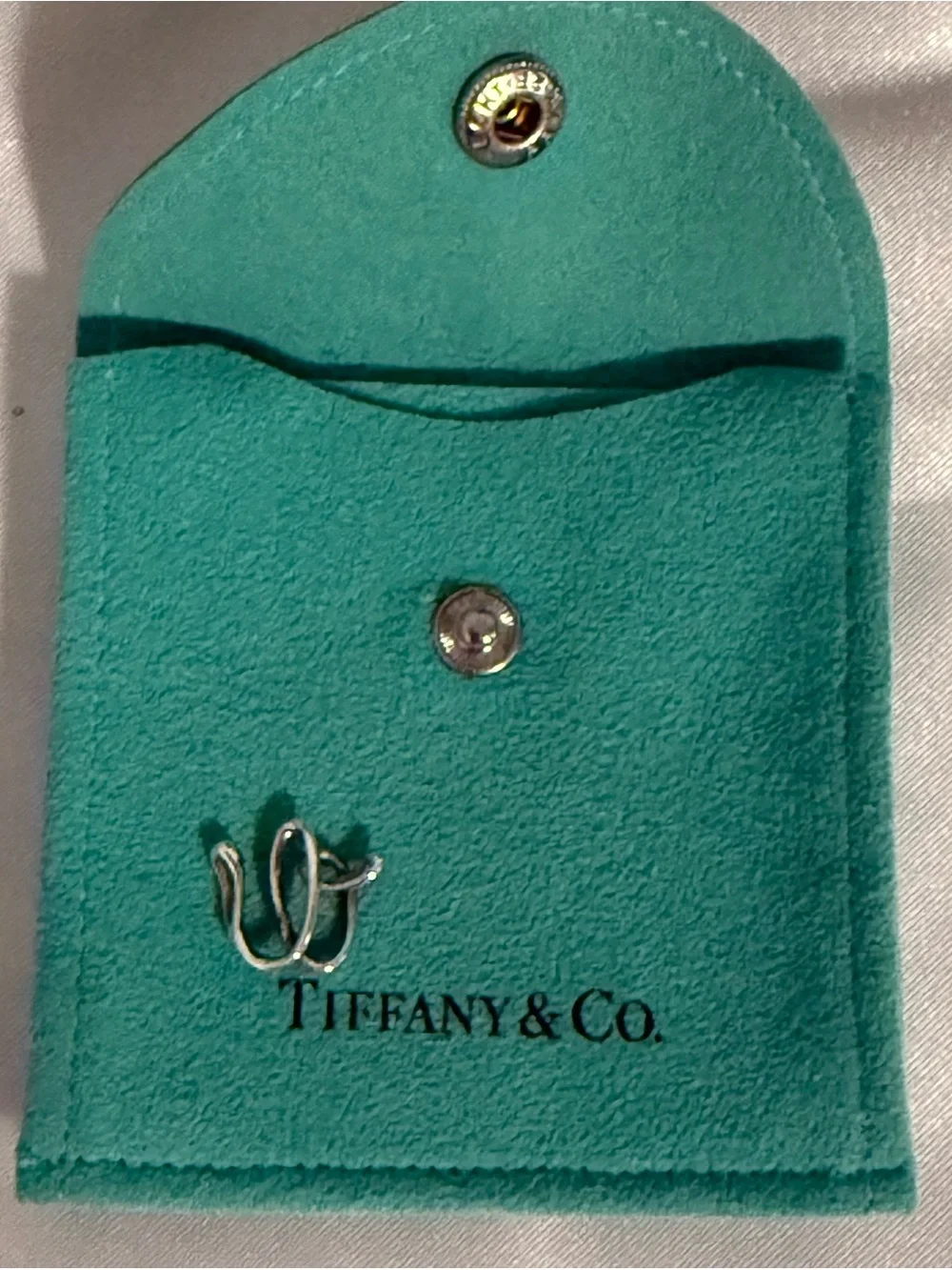 Tiffany&CO Rare and Vintage .925 sterling “Elsa Peretti” initial charm “W”.